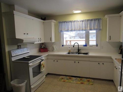 4614 53 Avenue, Barrhead, AB - Indoor Photo Showing Kitchen With Double Sink