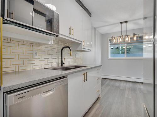 1 4616 47 Street, Leduc, AB - Indoor Photo Showing Kitchen With Double Sink