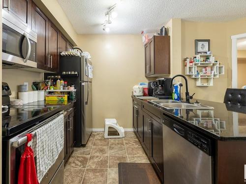 122 18126 77 Street, Edmonton, AB - Indoor Photo Showing Kitchen With Double Sink