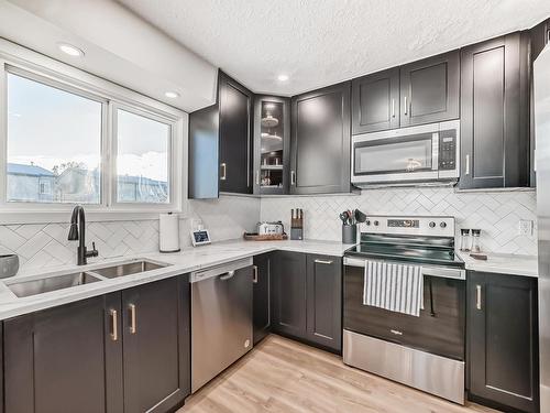 16934 109 Street, Edmonton, AB - Indoor Photo Showing Kitchen With Stainless Steel Kitchen With Double Sink With Upgraded Kitchen