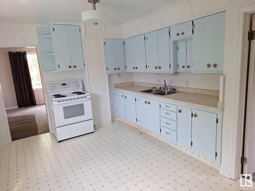 12941 125 Street, Edmonton, AB - Indoor Photo Showing Kitchen With Double Sink