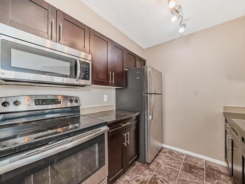 107 18122 77 Street, Edmonton, AB - Indoor Photo Showing Kitchen With Stainless Steel Kitchen