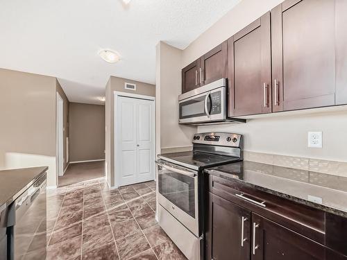 107 18122 77 Street, Edmonton, AB - Indoor Photo Showing Kitchen With Stainless Steel Kitchen