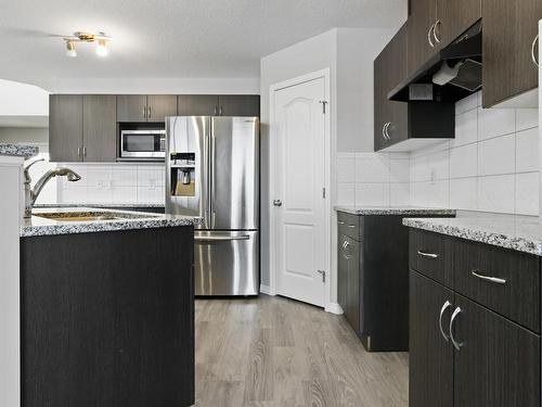 17039 38 Street Nw, Edmonton, AB - Indoor Photo Showing Kitchen With Stainless Steel Kitchen With Upgraded Kitchen