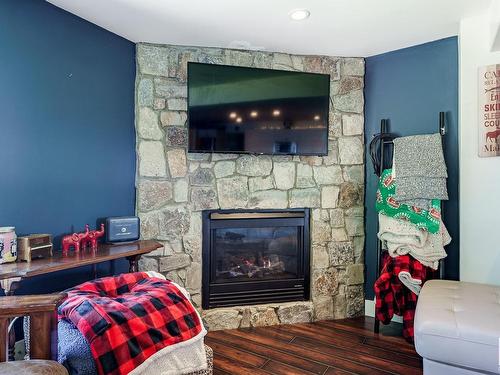 6816 St.Anne Trail, Rural Lac Ste. Anne County, AB - Indoor Photo Showing Living Room With Fireplace