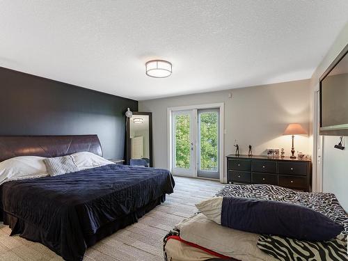 6816 St.Anne Trail, Rural Lac Ste. Anne County, AB - Indoor Photo Showing Bedroom