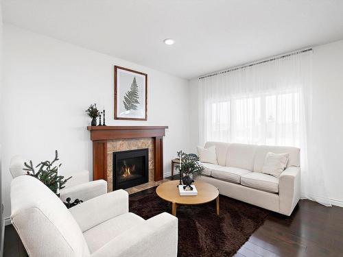 16106 10 Avenue, Edmonton, AB - Indoor Photo Showing Living Room With Fireplace