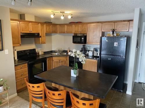 2210 320 Clareview Station Drive, Edmonton, AB - Indoor Photo Showing Kitchen With Double Sink