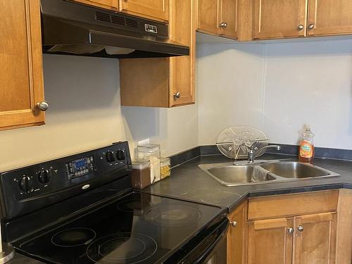 2210 320 Clareview Station Drive, Edmonton, AB - Indoor Photo Showing Kitchen With Double Sink