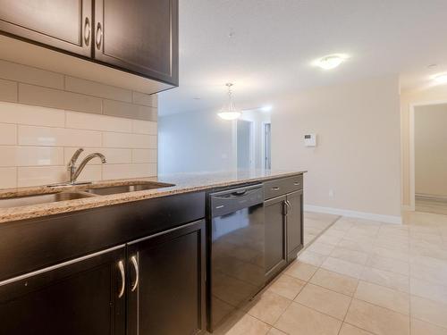 207 12660 142 Avenue, Edmonton, AB - Indoor Photo Showing Kitchen With Double Sink