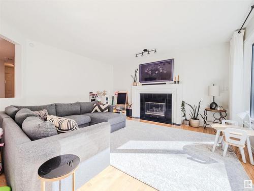 11407 12 Avenue, Edmonton, AB - Indoor Photo Showing Living Room With Fireplace