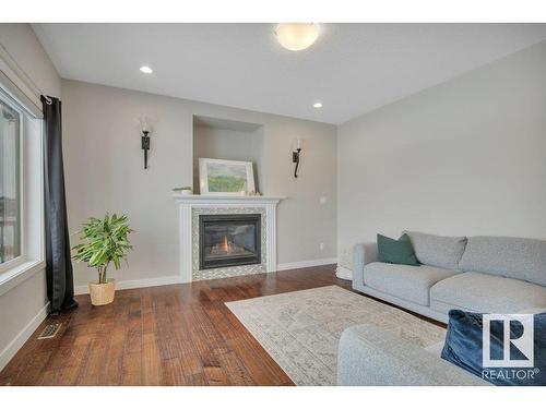 492 Reynalds Wynd, Leduc, AB - Indoor Photo Showing Living Room With Fireplace