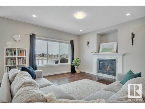 492 Reynalds Wynd, Leduc, AB - Indoor Photo Showing Living Room With Fireplace