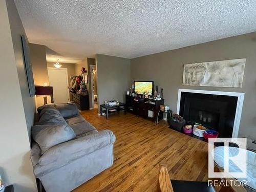 208 14803 51 Avenue, Edmonton, AB - Indoor Photo Showing Living Room