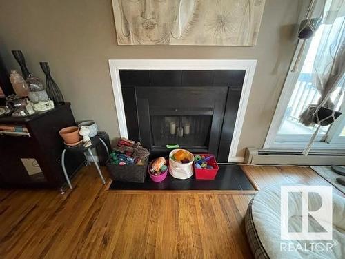 208 14803 51 Avenue, Edmonton, AB - Indoor Photo Showing Living Room With Fireplace