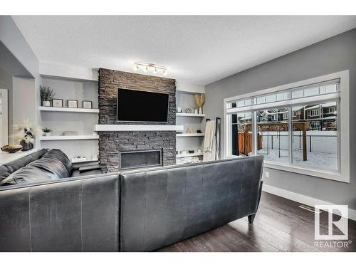 3727 Cherry Loop, Edmonton, AB - Indoor Photo Showing Living Room With Fireplace