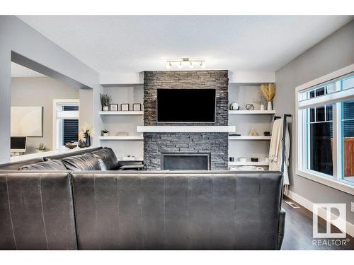 3727 Cherry Loop, Edmonton, AB - Indoor Photo Showing Living Room With Fireplace