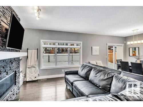 3727 Cherry Loop, Edmonton, AB - Indoor Photo Showing Living Room With Fireplace