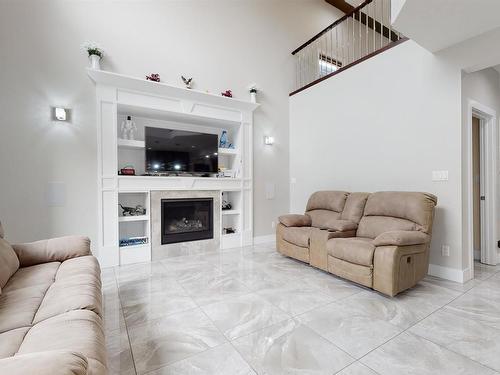 2617 21A Avenue, Edmonton, AB - Indoor Photo Showing Living Room With Fireplace