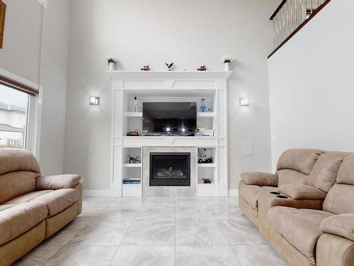 2617 21A Avenue, Edmonton, AB - Indoor Photo Showing Living Room With Fireplace