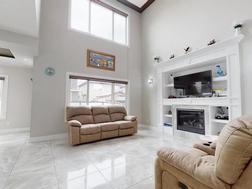 2617 21A Avenue, Edmonton, AB - Indoor Photo Showing Living Room With Fireplace