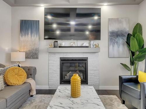 12814 204A Street, Edmonton, AB - Indoor Photo Showing Living Room With Fireplace