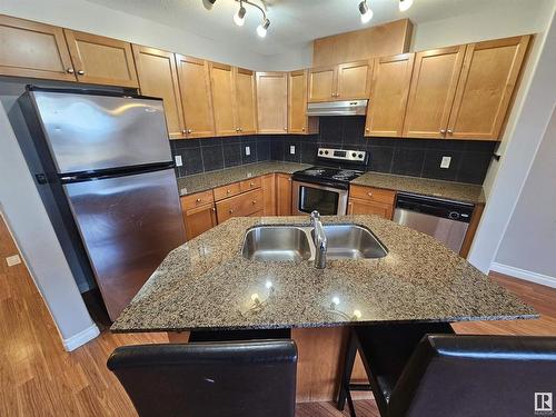 117 101 Drive, Leduc, AB - Indoor Photo Showing Kitchen With Double Sink