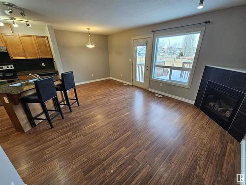 117 101 Drive, Leduc, AB - Indoor With Fireplace