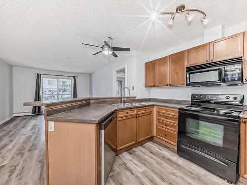 110 13710 150 Avenue, Edmonton, AB - Indoor Photo Showing Kitchen