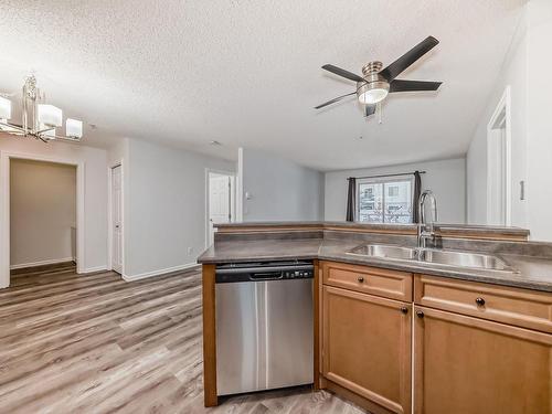 110 13710 150 Avenue, Edmonton, AB - Indoor Photo Showing Kitchen With Double Sink