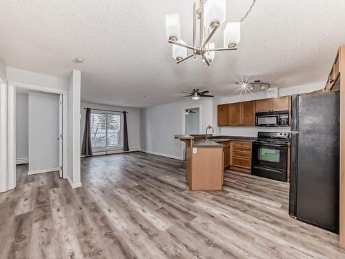 110 13710 150 Avenue, Edmonton, AB - Indoor Photo Showing Kitchen