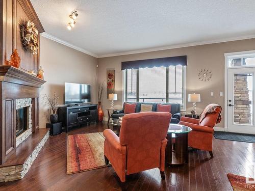 230 Ambleside Drive, Edmonton, AB - Indoor Photo Showing Living Room With Fireplace