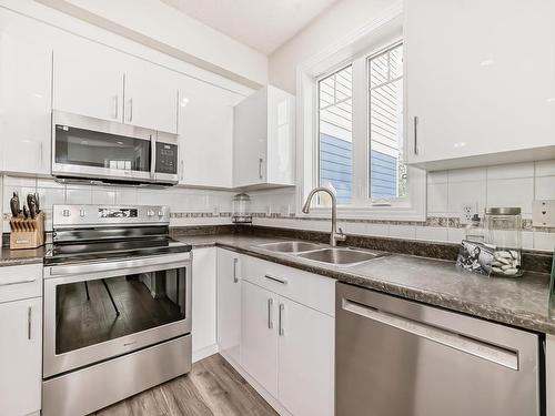 319 12111 51 Avenue, Edmonton, AB - Indoor Photo Showing Kitchen With Stainless Steel Kitchen With Double Sink