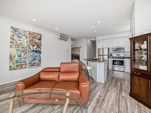 319 12111 51 Avenue, Edmonton, AB - Indoor Photo Showing Living Room