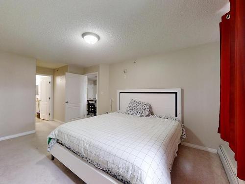 425 111 Edwards Drive, Edmonton, AB - Indoor Photo Showing Bedroom