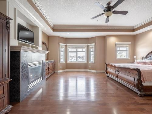 839 Wildwood Crescent, Edmonton, AB - Indoor Photo Showing Bedroom With Fireplace