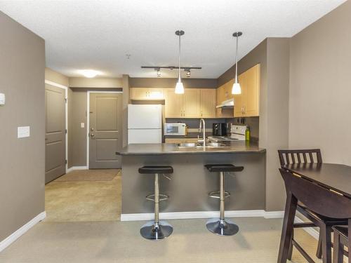 316 11445 Ellerslie Road, Edmonton, AB - Indoor Photo Showing Kitchen With Double Sink