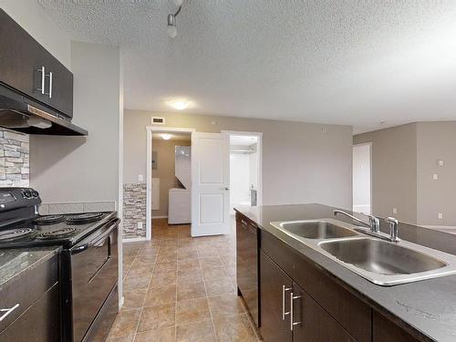 404 1510 Watt Drive, Edmonton, AB - Indoor Photo Showing Kitchen With Double Sink