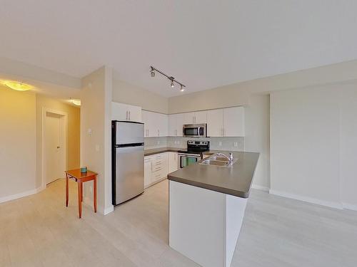 1905 10136 104 Street Nw, Edmonton, AB - Indoor Photo Showing Kitchen With Double Sink