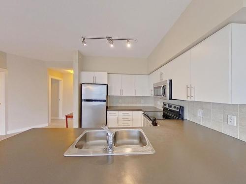 1905 10136 104 Street Nw, Edmonton, AB - Indoor Photo Showing Kitchen With Stainless Steel Kitchen With Double Sink