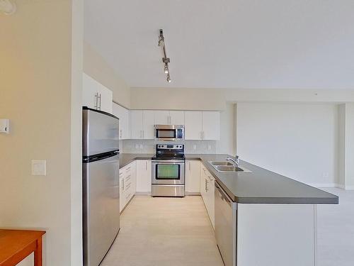 1905 10136 104 Street Nw, Edmonton, AB - Indoor Photo Showing Kitchen With Stainless Steel Kitchen With Double Sink