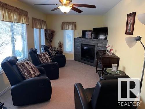 5438 43 Street, Vegreville, AB - Indoor Photo Showing Living Room With Fireplace