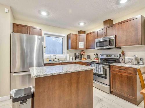 12219 117 Av, Edmonton, AB - Indoor Photo Showing Kitchen With Stainless Steel Kitchen