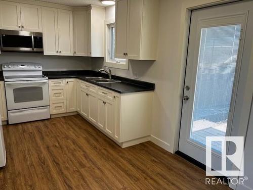 5306 45 Street, Vegreville, AB - Indoor Photo Showing Kitchen With Double Sink