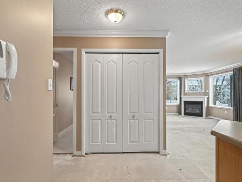 215 17150 94A Avenue, Edmonton, AB - Indoor With Fireplace