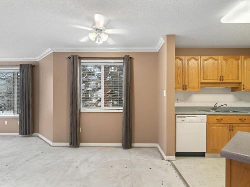 215 17150 94A Avenue, Edmonton, AB - Indoor Photo Showing Kitchen With Double Sink