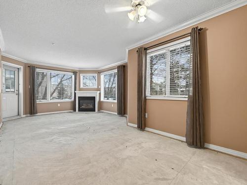 215 17150 94A Avenue, Edmonton, AB - Indoor With Fireplace