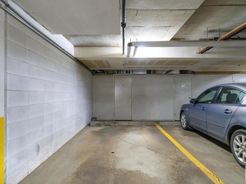 215 17150 94A Avenue, Edmonton, AB - Indoor Photo Showing Garage