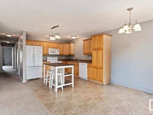 #102 4103 43 Avenue, Bonnyville Town, AB - Indoor Photo Showing Kitchen