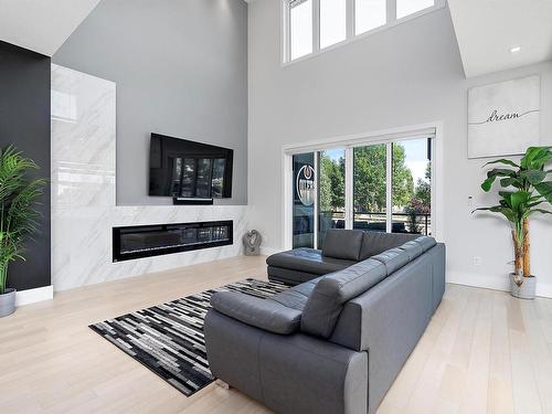 1303 Clement Court, Edmonton, AB - Indoor Photo Showing Living Room With Fireplace